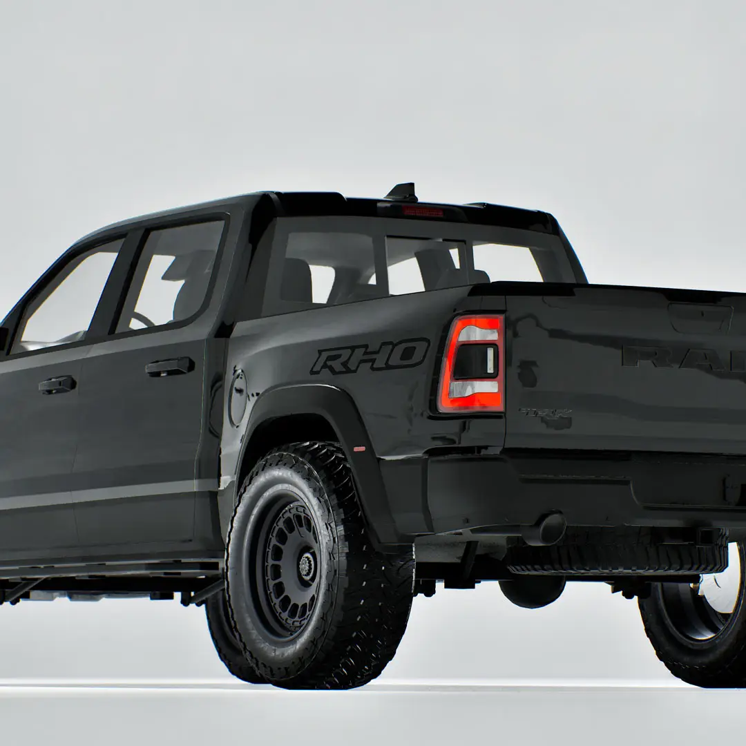 black Ram RHO blackout bedside decals on a white truck